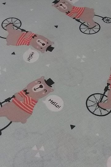 Baumwollstoff TEDDYBÄR AUF EINEM RAD