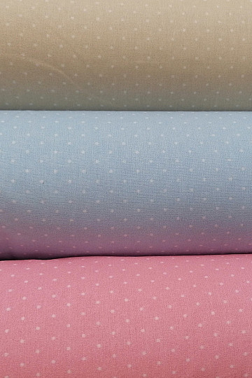 Rosa gepunkteter Baumwollstoff