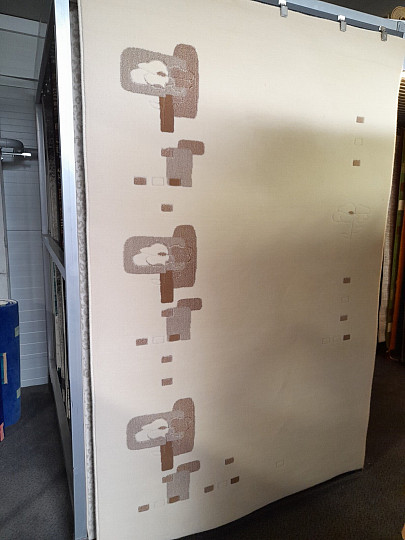 Hellbeiger Wollteppich