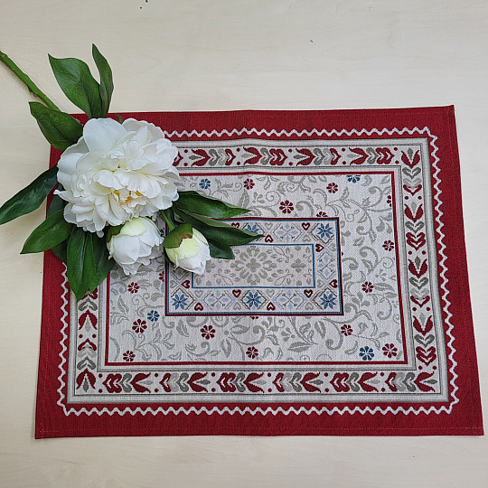 Platzset aus Wandteppich mit Blumenmotiv im Rahmen
