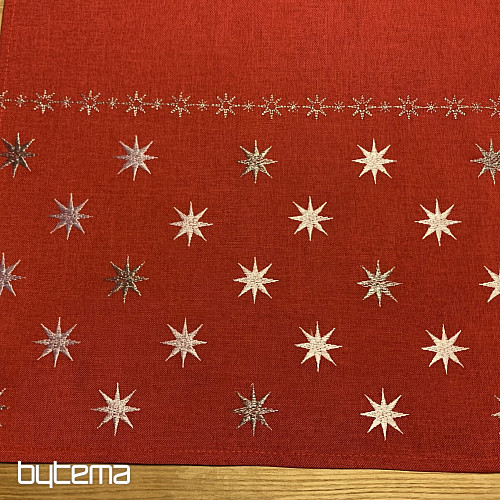 Rot bestickte Weihnachtstischdecke mit Sternen