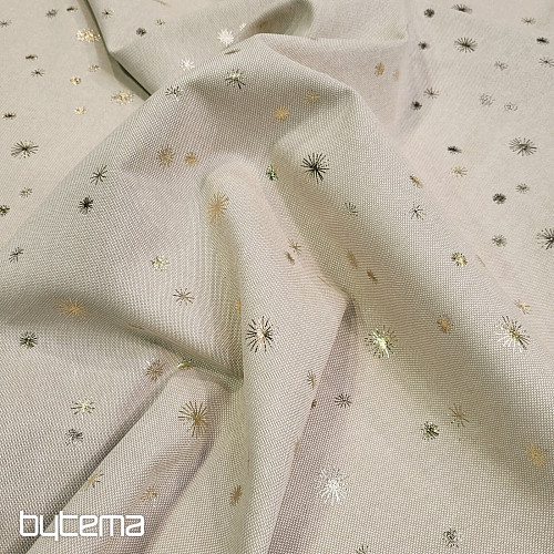 Baumwoll-Canvas-Stoff mit goldenen Sternen auf dem Schneidebrett