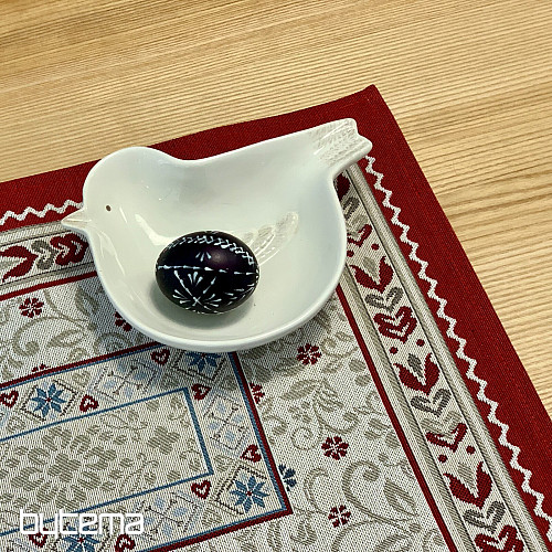 Platzset aus Wandteppich mit Blumenmotiv im Rahmen